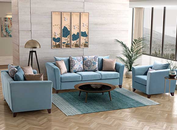 Living room with light blue sofa set 